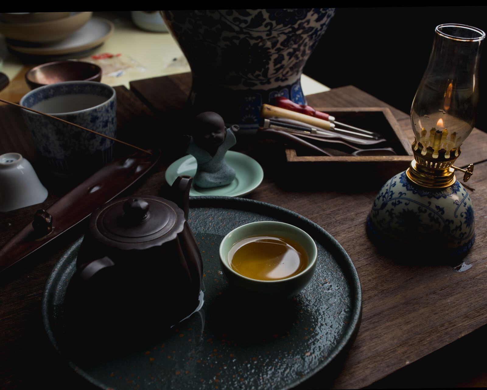 Chinese tea set on a wooden table, reflecting the calm of Taiji Foot Wellness