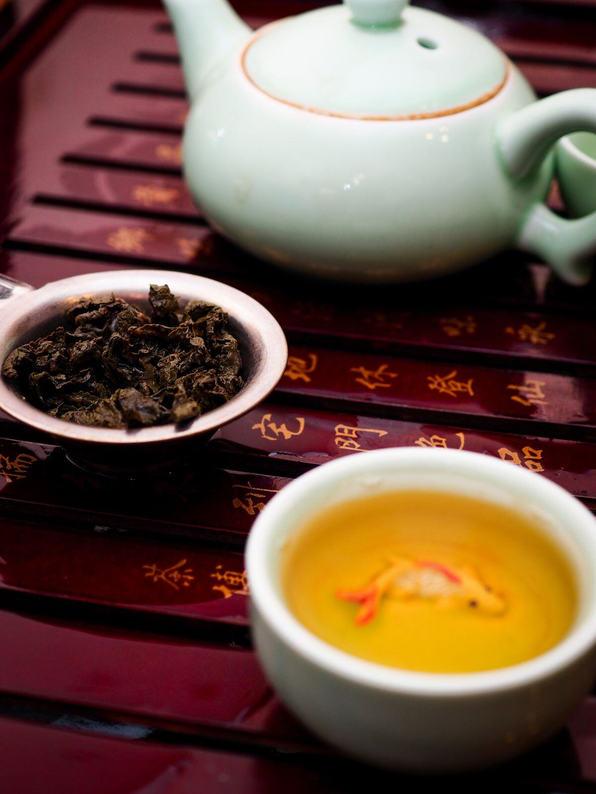 Celadon teapot and cup of tea, symbol of the calm Chinese wellness tradition