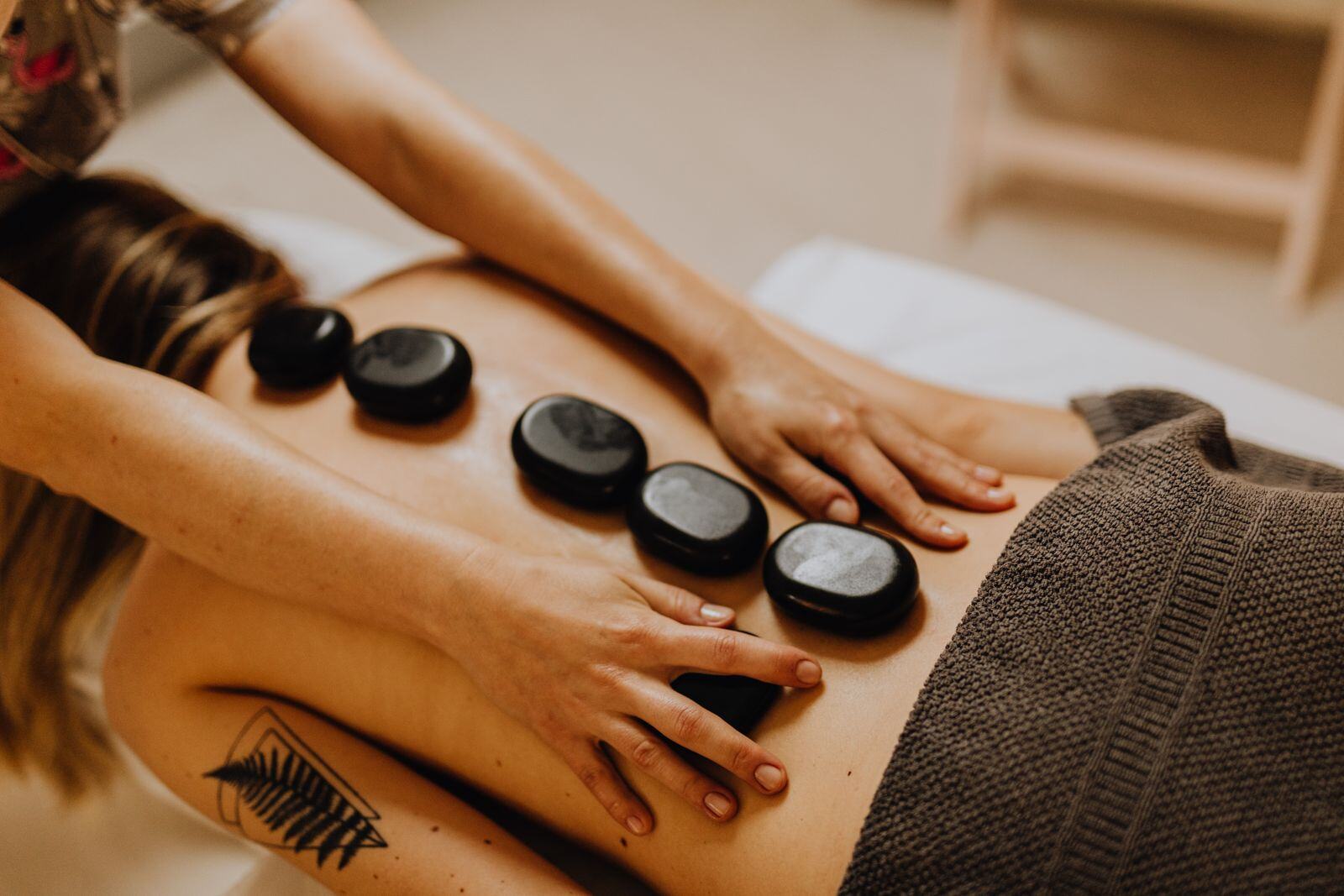 Relaxing massage session at a wellness studio near Main Street, Flushing
